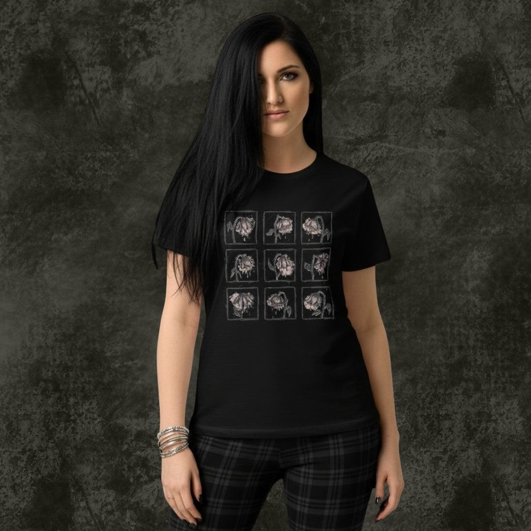 Person wearing a black Gildan 64000L tee with a grid of crying wilting flowers with soft pink details