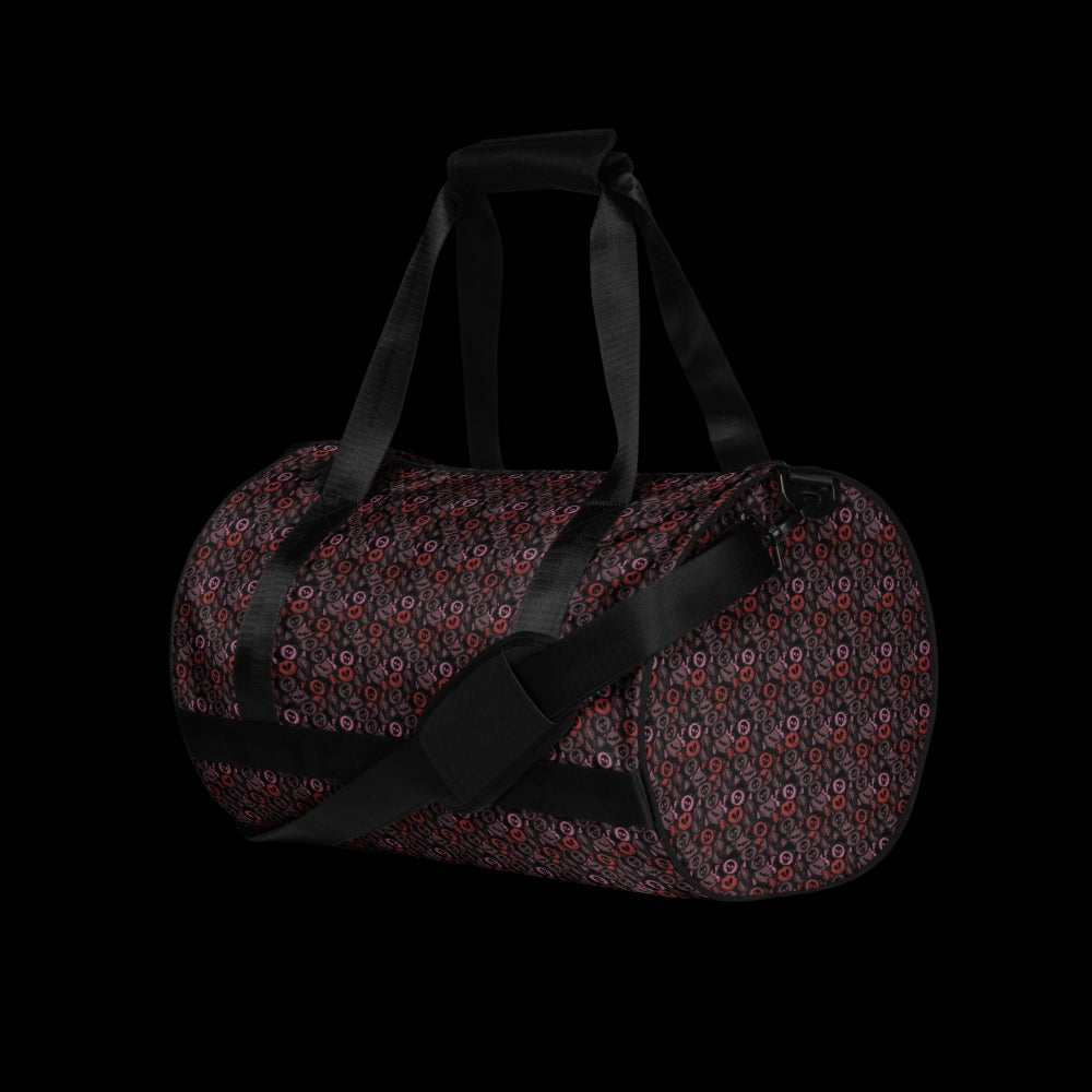 Duffel bag with a skull candy pattern in red crushed velvet shades
