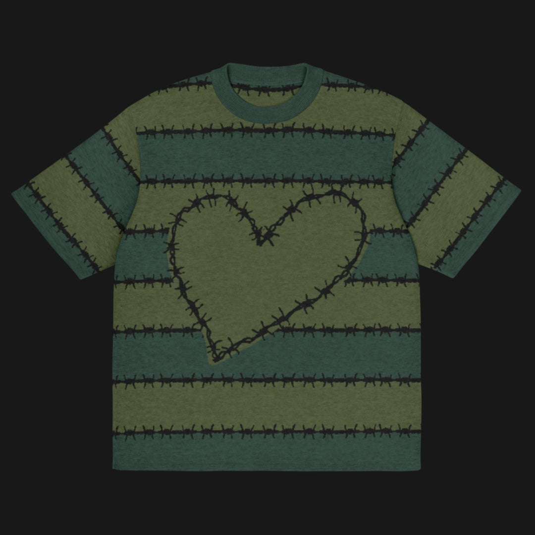 A jacquard knitted tee in dark moody shades, featuring stripes and a large heart lined with barbed wire
