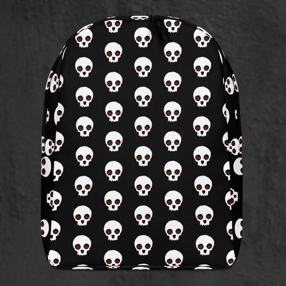 a backpack with a large skull pattern on black