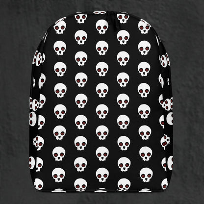 a backpack with a large skull pattern on black