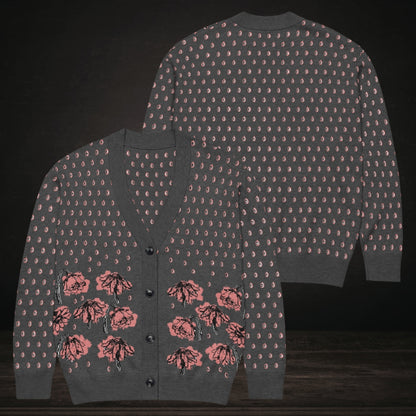 An emotional grey knitted cardigan with tears and crying flowers