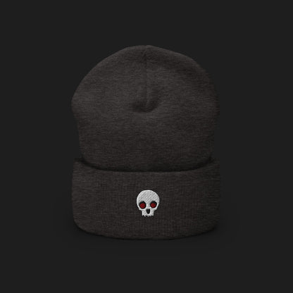 A cuffed beanie with a clean minimalistic skull embroidery