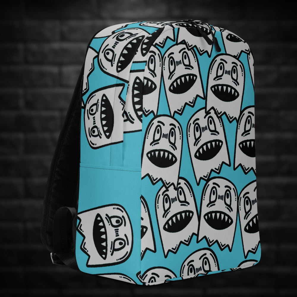 A backpack with large grey grinning goblins on skye blue background