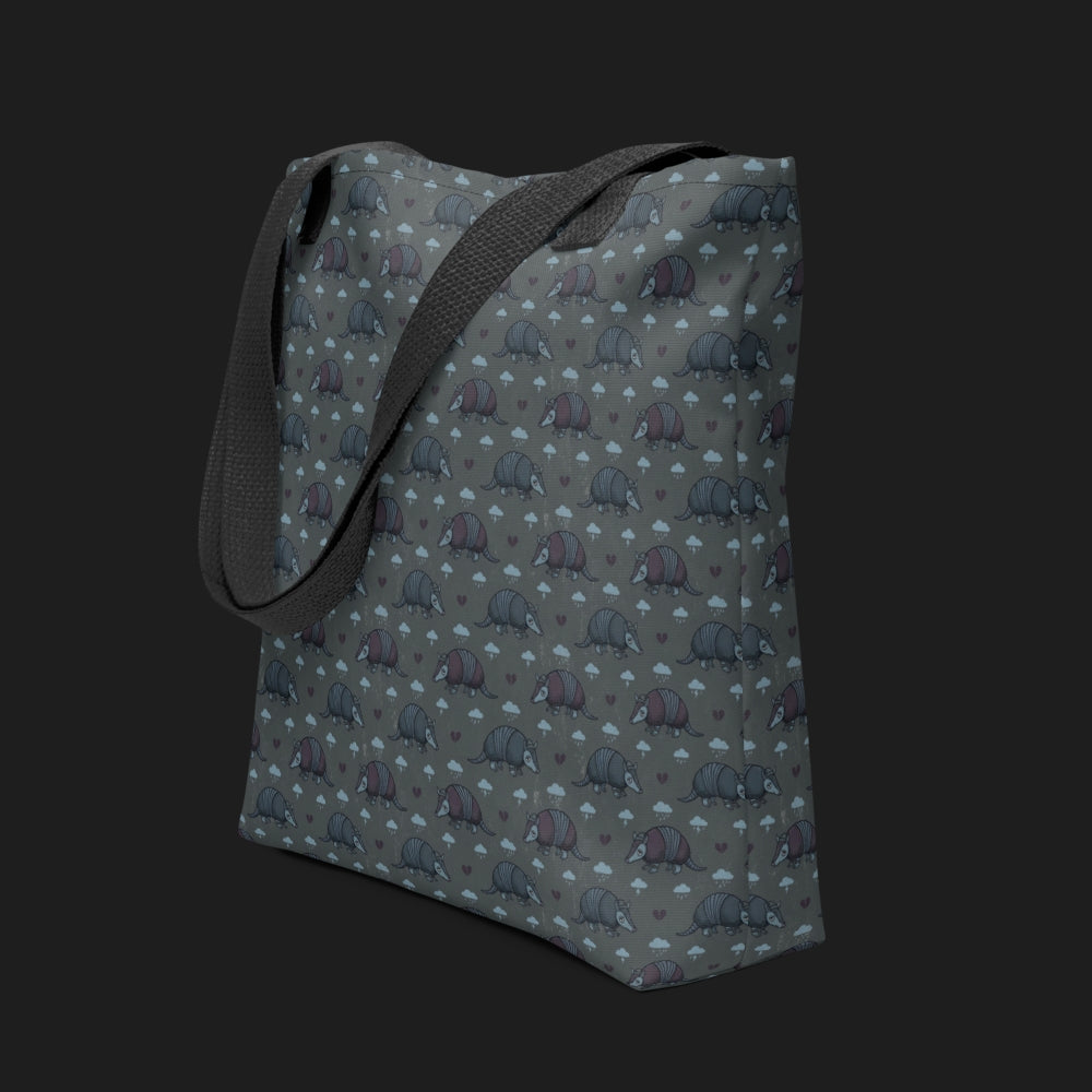 tote bag with an emo armadillo pattern with broken hearts and storm clouds in storm grey