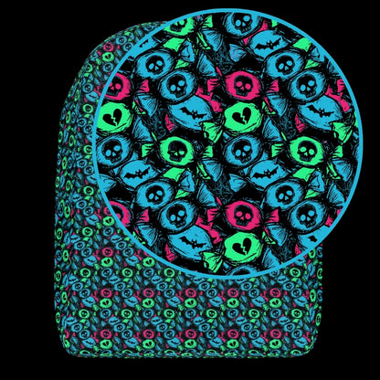 a backpack with an alt emo skull candy pattern in teal pink and green