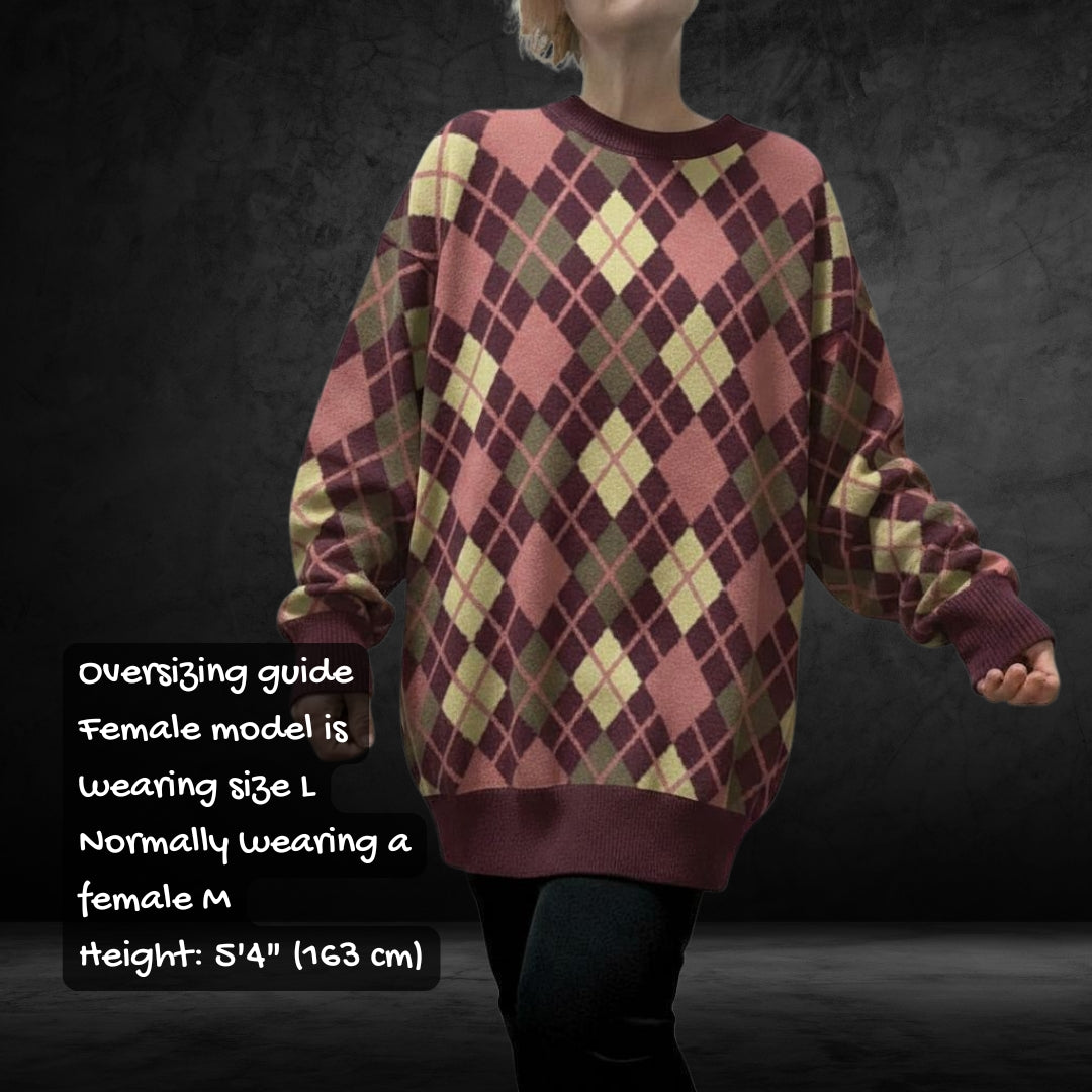 Person wearing a burgundy argyle patterned oversized sweater with text providing size and height information.