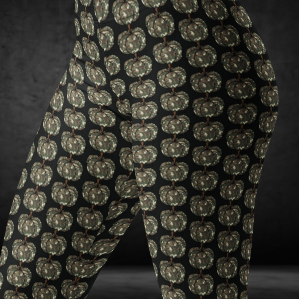 leggings with camouflage colored pumpkins on black background