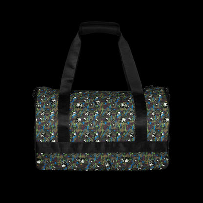 a duffel gym bag with a camo, paint splatter, and gritty skulls pattern in green and neon shades