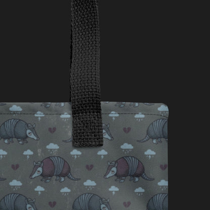 tote bag with an emo armadillo pattern with broken hearts and storm clouds in storm grey