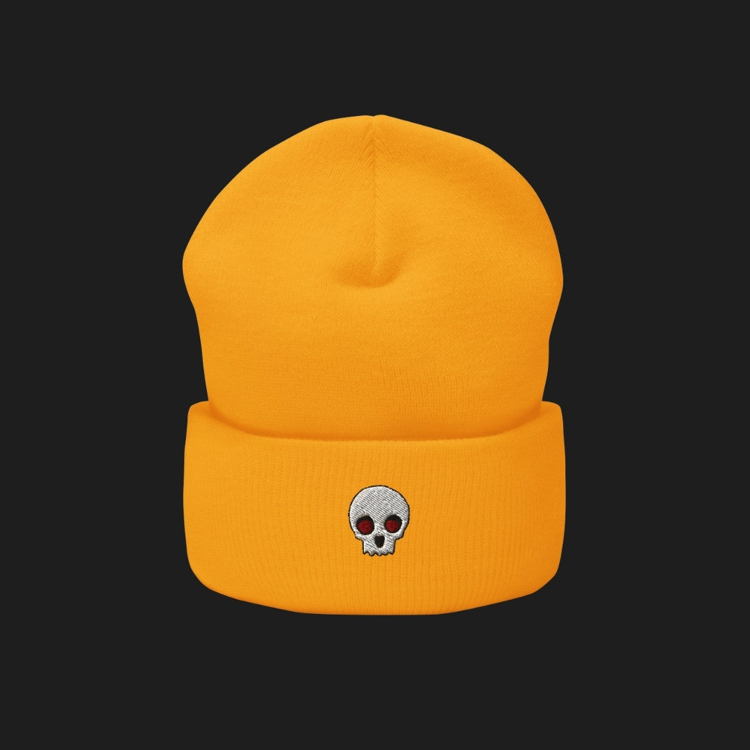 A cuffed beanie with a clean minimalistic skull embroidery