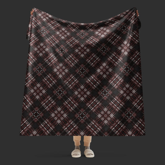 a fleece sherpa blanket with a dark alt emo colored plaid pattern