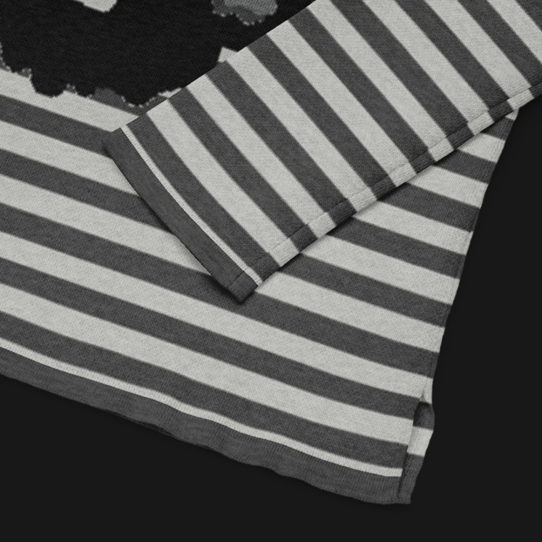 Grey striped sweater with a large x-eyed skull design