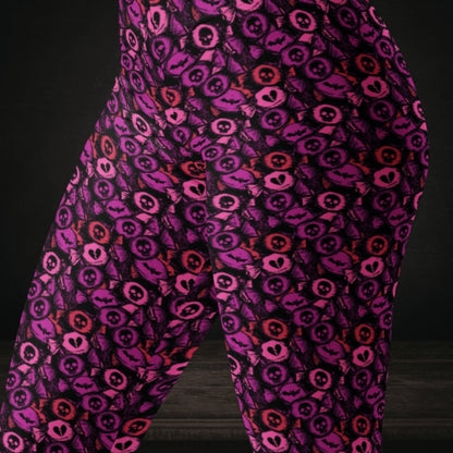 Leggings with skull and broken heart candy in purple pink and red