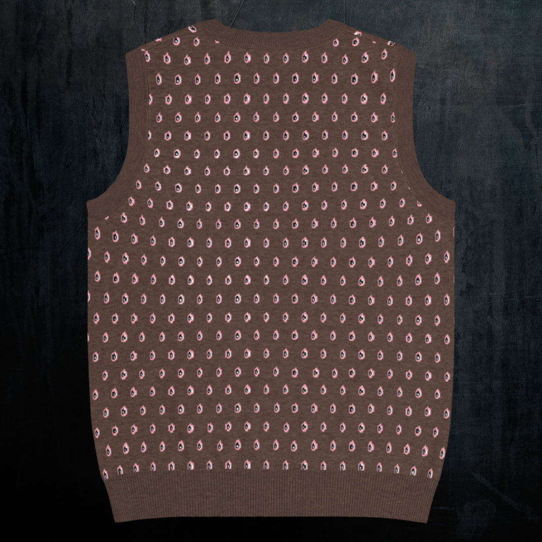 a soil brown knitted vest with crying pink flowers and droplets