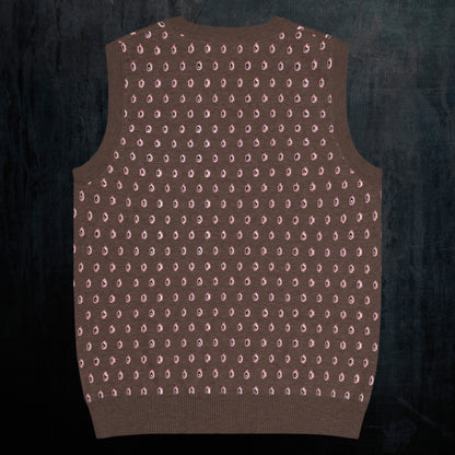 a soil brown knitted vest with crying pink flowers and droplets