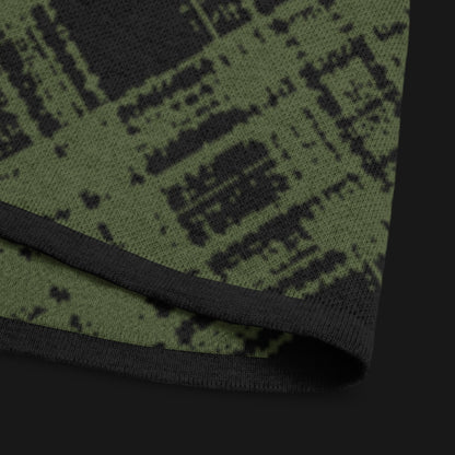 A dark black and olive broken plaid pattern knitted tee