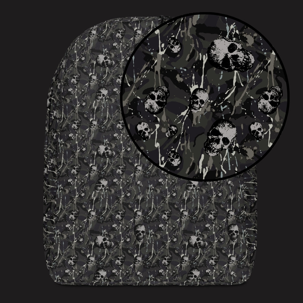 a backpack with a camo and paint and gritty skulls pattern in dark grey