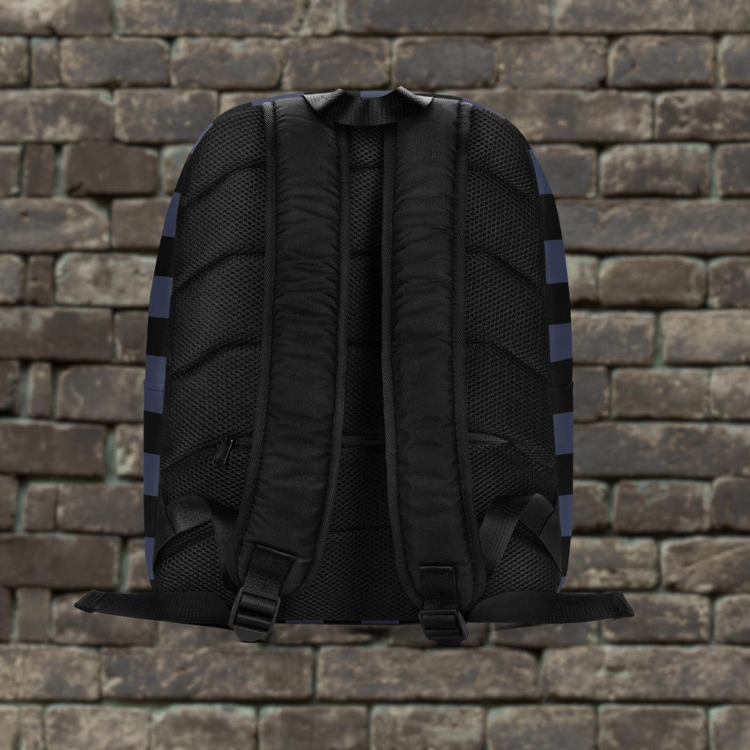 Backpack with blue and black grunge style dark stripes and text "here we are now" in graffiti tag style