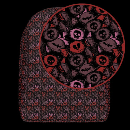 a backpack with an alt emo skull candy pattern in burgundy pink and red