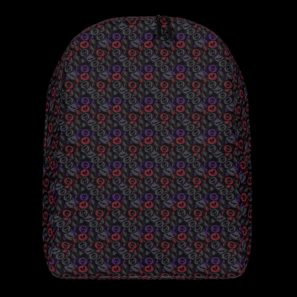 a backpack with an alt emo skull candy pattern in dark grey, purple and red
