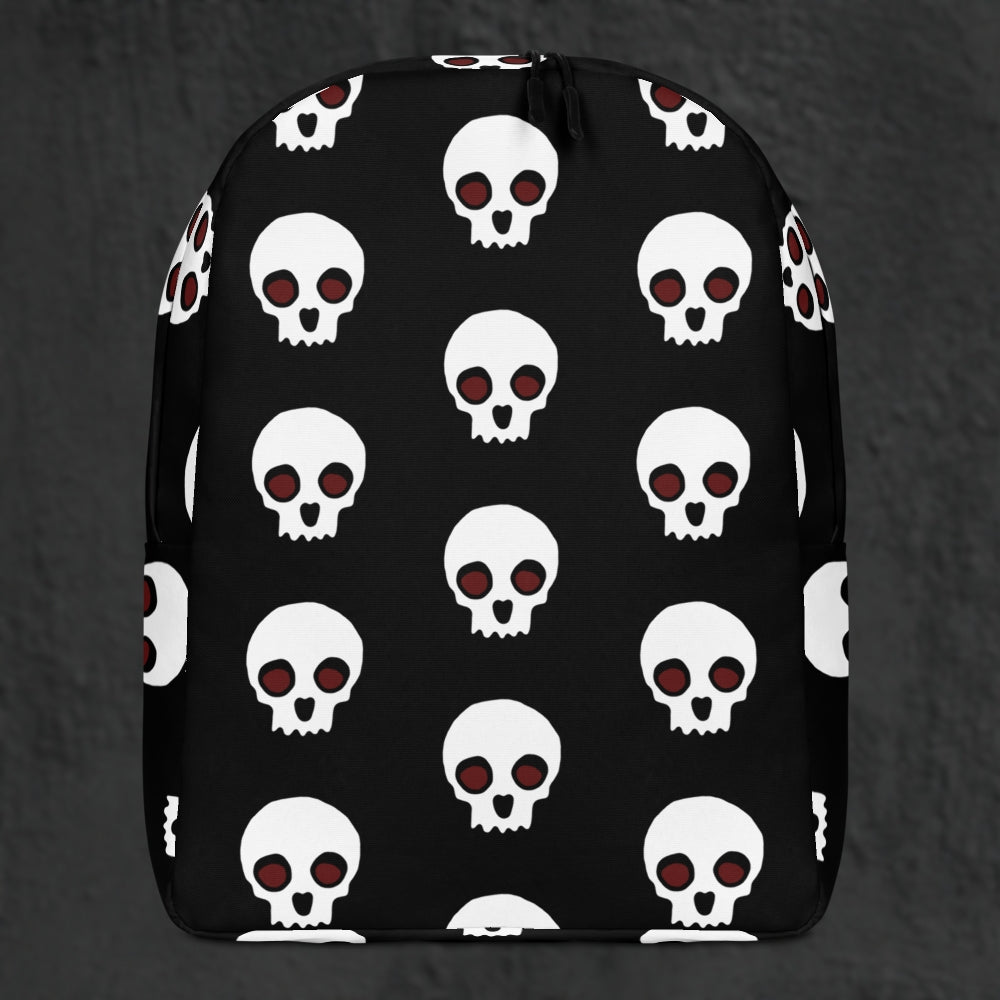 a backpack with a large skull pattern on black
