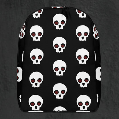 a backpack with a large skull pattern on black