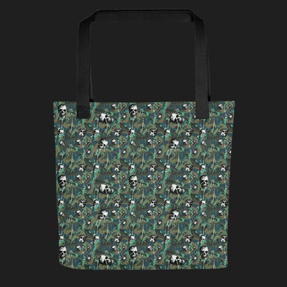Tote bag with a rebellious camo background, gritty skulls, and teal paint splatter
