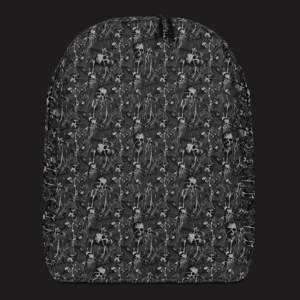 a backpack with a camo and paint and gritty skulls pattern in dark grey