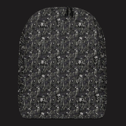 a backpack with a camo and paint and gritty skulls pattern in dark grey