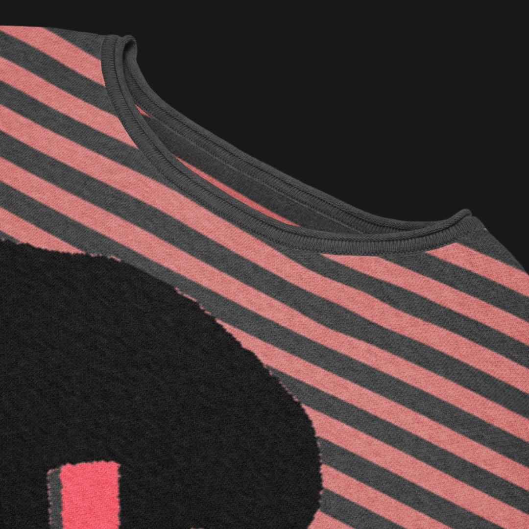Pink and charcoal striped sweater with a large x-eyed skull design