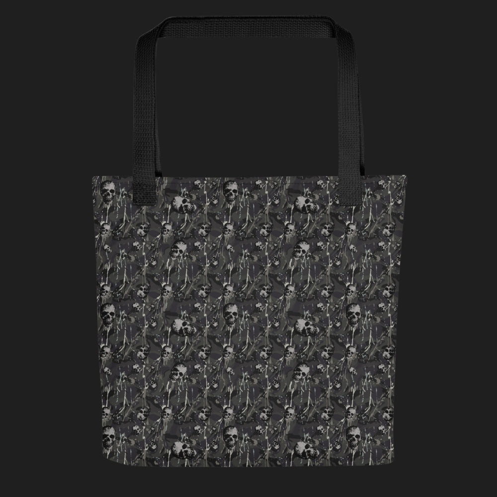 Tote bag with a rebellious camo background, gritty skulls, and paint splatter in grey shades