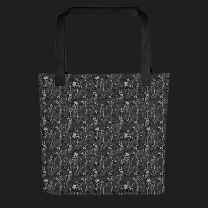 Tote bag with a rebellious camo background, gritty skulls, and paint splatter in grey shades