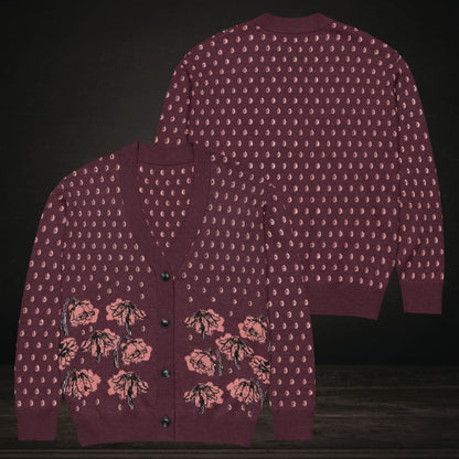 An emotional burgundy knitted cardigan with tears and crying flowers