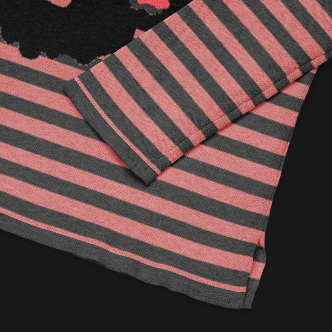 Pink and charcoal striped sweater with a large x-eyed skull design
