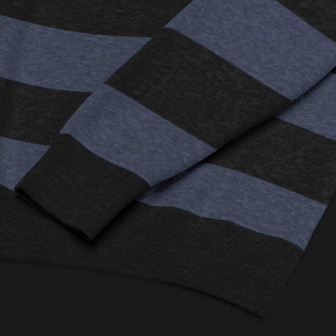 a grunge striped sweater with wide black and dark stripes