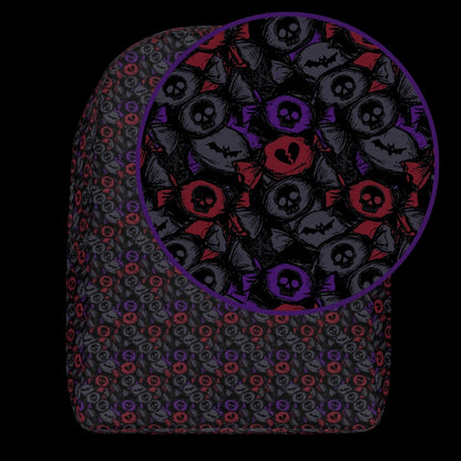 a backpack with an alt emo skull candy pattern in dark grey, purple and red