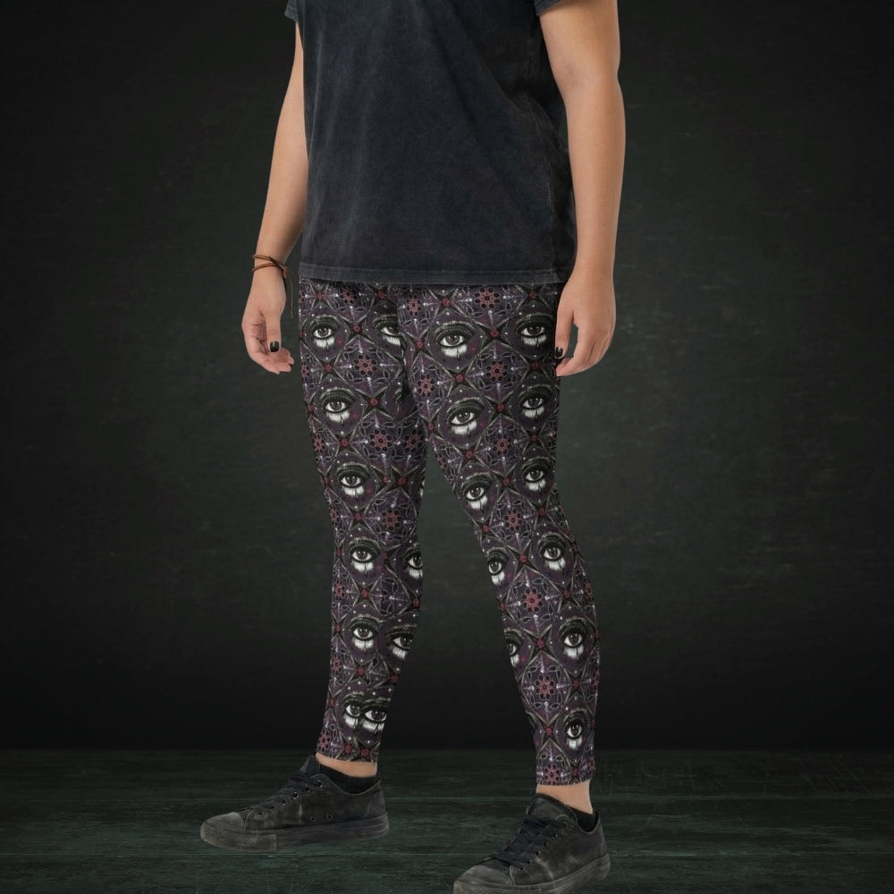 person wearing dARK kaleidoscope like leggings with crying eyes and emo symbols
