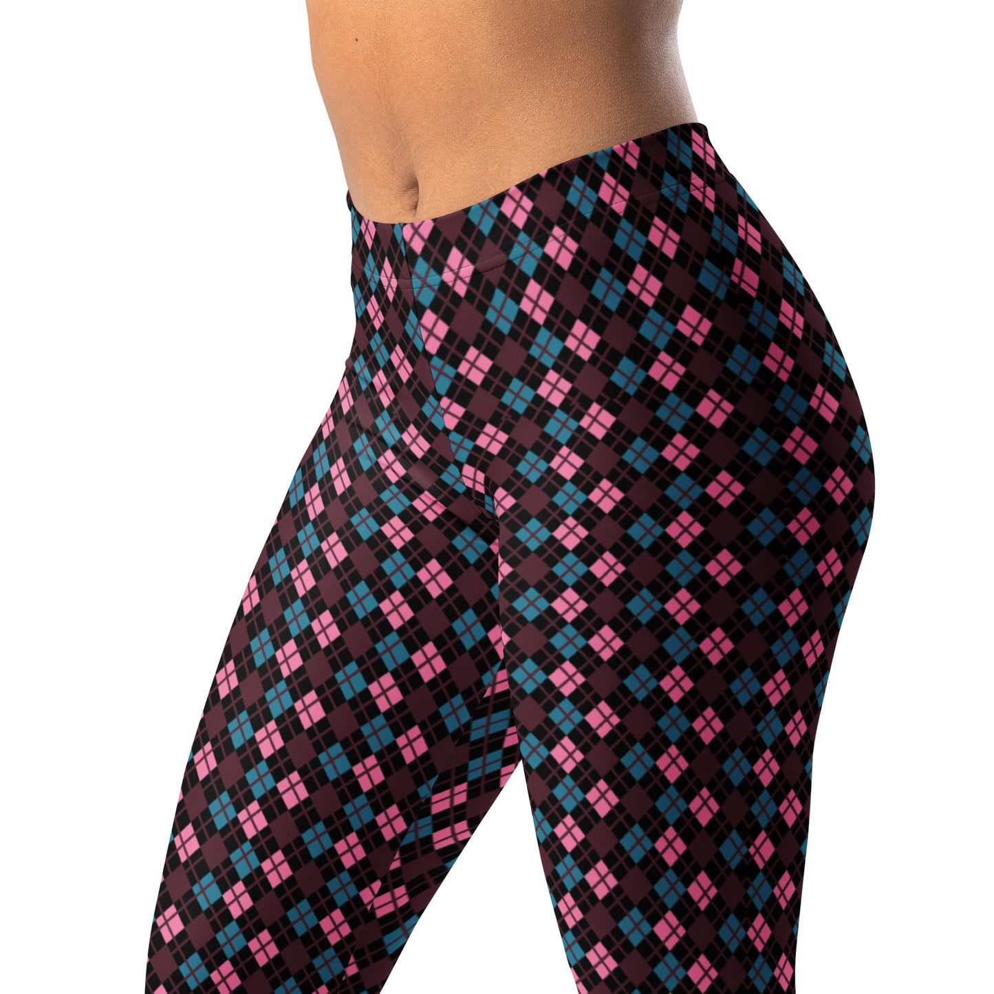 Woman wearing a colorful jacket and diamond patterned leggings