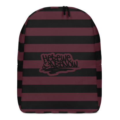 Backpack with grunge style dark wide stripes and text "here we are now"