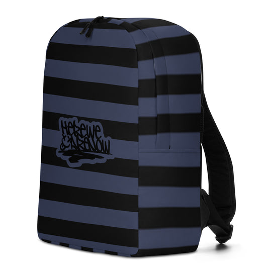 Backpack with grunge style dark wide stripes and text "here we are now"