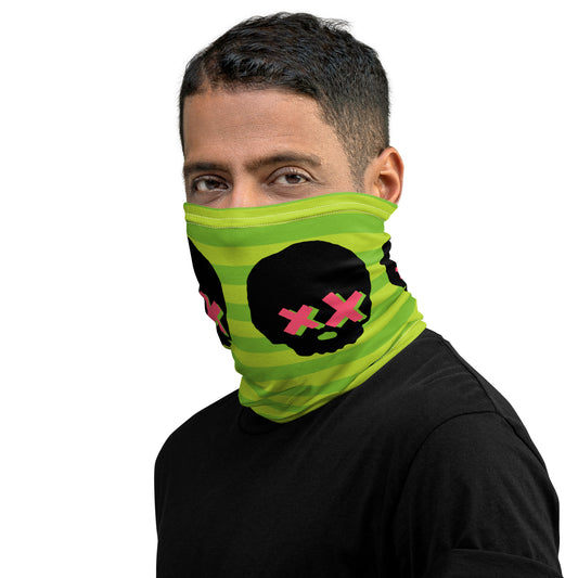 man wearing green striped neck gaiter with pink x-eyed skulls over his face