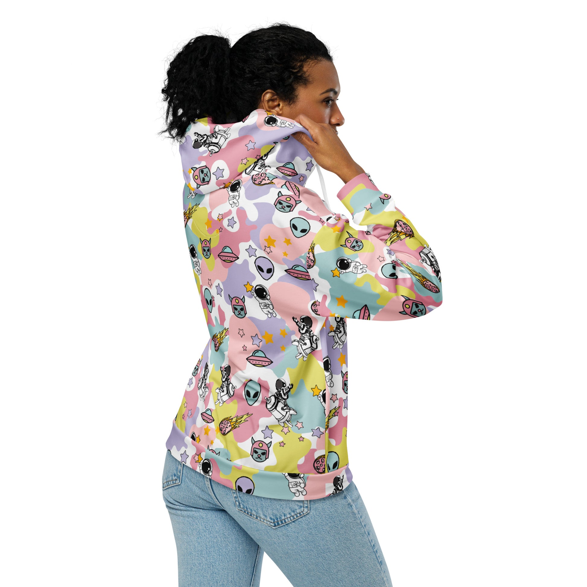 Woman wearing a emo and scene zip hoodie with ice cream ike colors and space theme