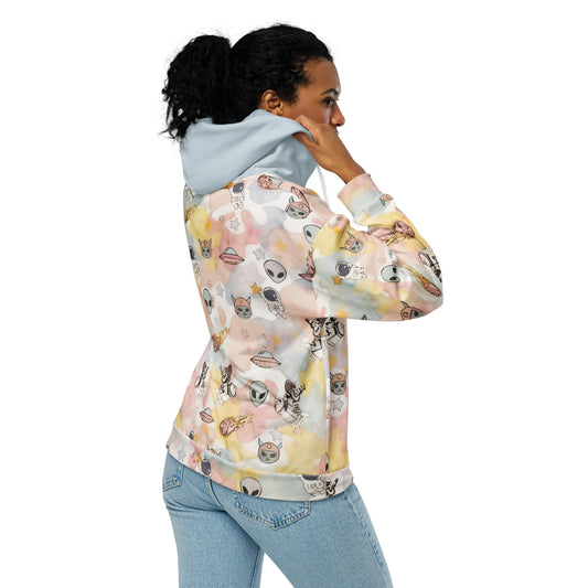 Woman wearing a emo and scene zip hoodie with ice cream like pastel colors and space theme