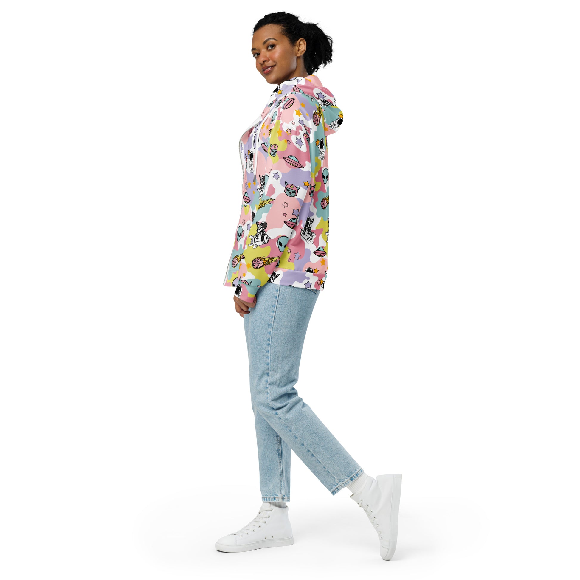 Woman wearing a emo and scene zip hoodie with ice cream ike colors and space theme