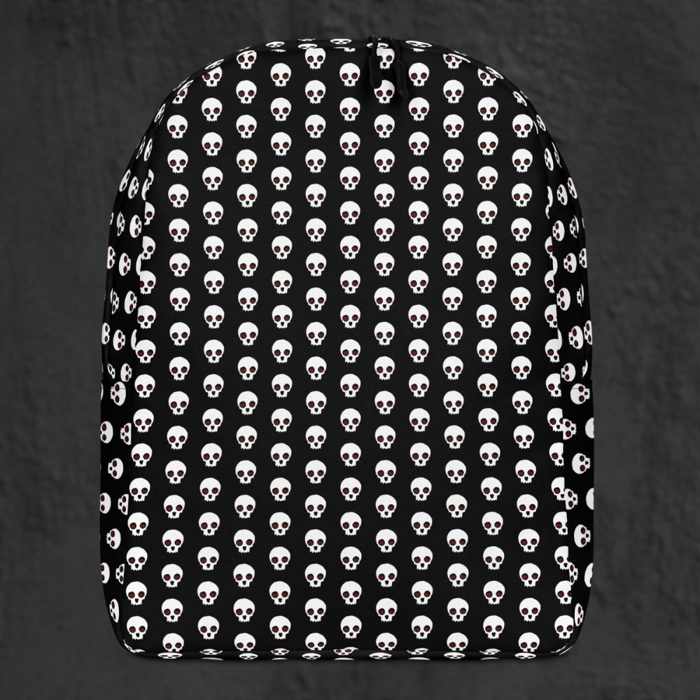 a backpack with a skull pattern on black
