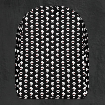 a backpack with a skull pattern on black