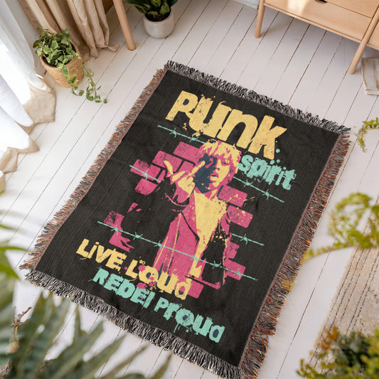 a woven blanket with text "punk spirit, live loud, rebel proud" and an rebellious image, in black, pink and yellow