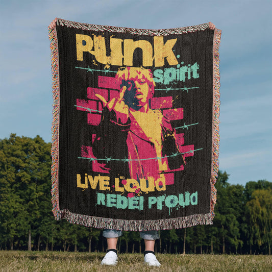 a woven blanket with text "punk spirit, live loud, rebel proud" and an rebellious image, in black, pink and yellow