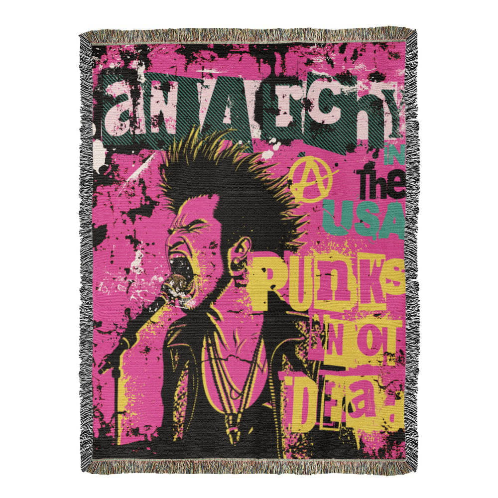 a woven blanket with a punk collage in pink black and yellow and text anarchy in the usa